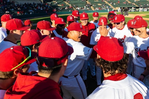 Stanford baseball team huddled.